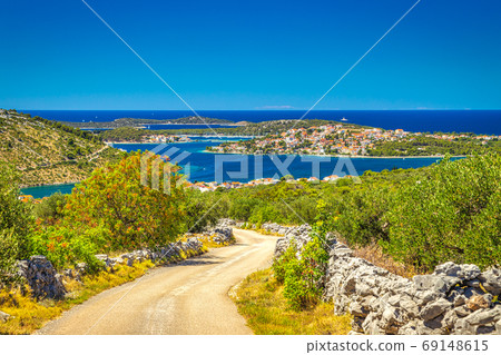Road towards the Rogoznica village. 69148615