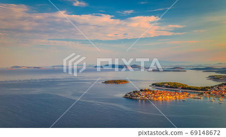 Panoramic view of Adriatic coast with The Primosten town. Panoramic view of Adriatic coast with The Primosten town. 69148672