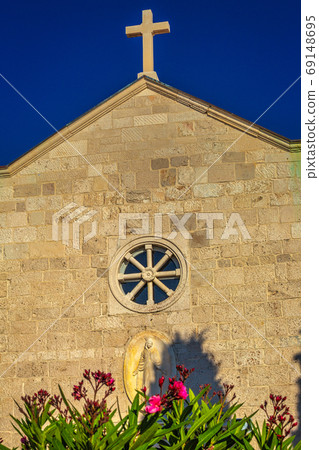 St George Church in Primosten town, a tourist destination. 69148695