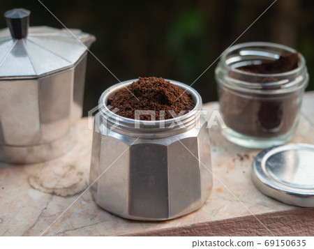 ground coffee in Moka pot. ground coffee in Moka pot. 69150635
