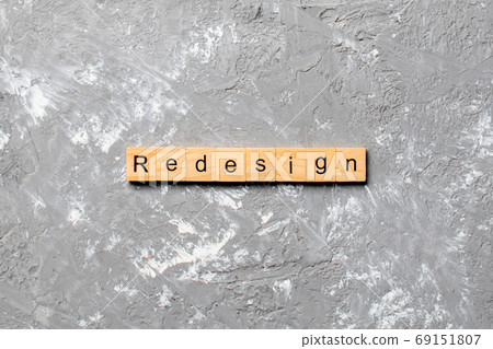 REDESIGN word made with wooden blocks concept 69151807