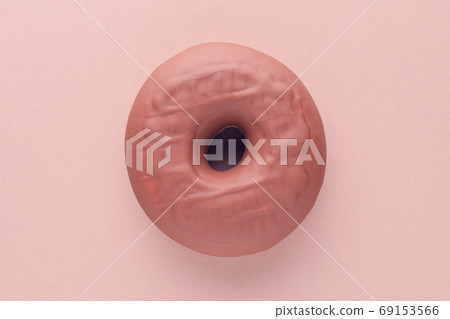 chocolate donut on brown background, flat lay 69153566
