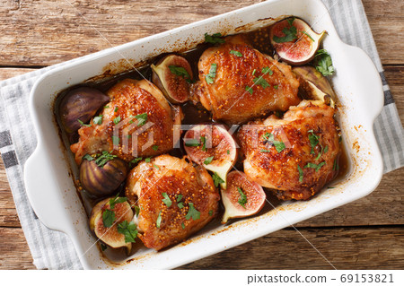 Honey chicken thighs baked with ripe figs, mustard and herbs clo Honey chicken thighs baked with ripe figs, mustard and herbs clo 69153821