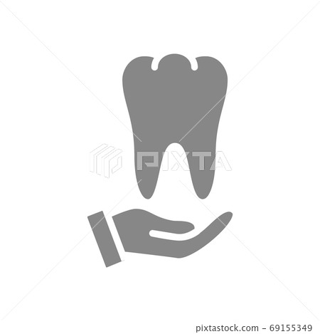 Human tooth on hand gray icon. Disease prevention symbol 69155349