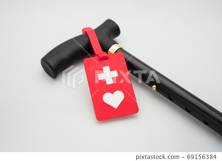 Cane and help mark on white background 69156384