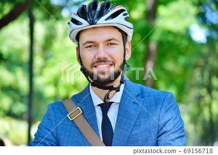 Happy bearded businessman in helmet Happy bearded businessman in helmet 69156718