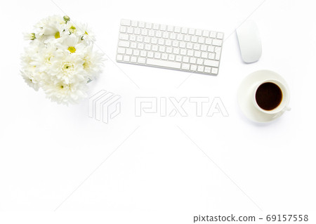 Women's stylish table desk. Workspace with computer, coffee and feminine accessories on white background. Magazines, websites. Flat lay, top view  69157558