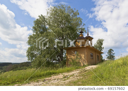 Rural landscape with a chapel. Chapel of the Assumption of the Mother of God in the village Markovskaya, Verhovazhskogo district, Vologda region 69157602