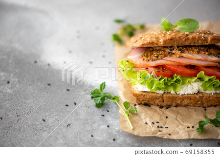 sandwich with ham, lettuce, tomato and mustard sandwich with ham, lettuce, tomato and mustard 69158355