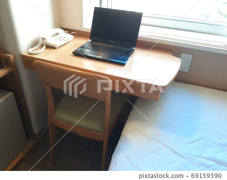Online remote work at the hotel 69159390