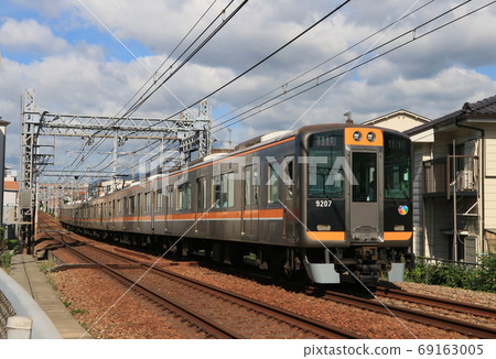 Hanshin 9000 series train running near Uchide station 69163005