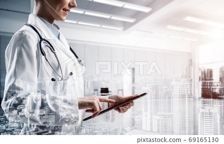 Successful doctor and modern technologies. 69165130