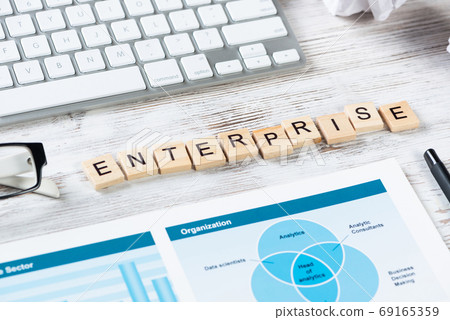 Enterprise concept with letters on cubes Enterprise concept with letters on cubes 69165359