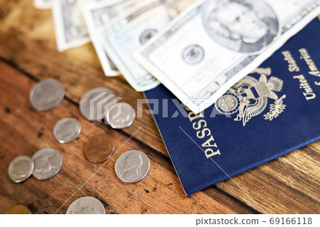 American passport and American banknotes and coins Travel image American passport and American banknotes and coins Travel image 69166118