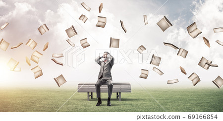 Young man in suit in park dont want to hear anything Young man in suit in park dont want to hear anything 69166854