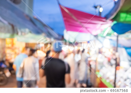 Blur the country river evening market Thai style with people relax and chill out background. Blur the country river evening market Thai style with people relax and chill out background. 69167568