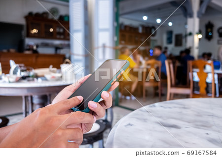 Man hand using smartphone to do work business, social network, communication. Man hand using smartphone to do work business, social network, communication. 69167584