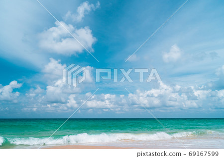 Tropical nature clean beach and white sand in summer with sun light blue sky and bokeh background. 69167599