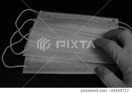 Medical mask and protected blue gloves. Medical protective shielding bandage. Coronavirus. Medical mask and protected blue gloves. Medical protective shielding bandage. Coronavirus. 69169727