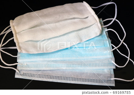 Medical disposable face masks. Coronavirus. Worldwide quarantine. Medical disposable face masks. Coronavirus. Worldwide quarantine. 69169785