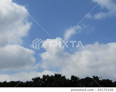 Hot summer white clouds and blue sky 69170199