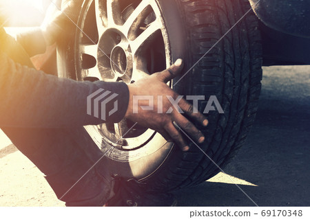 Close up view on wheel repair process Close up view on wheel repair process 69170348