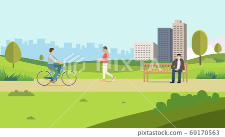 People in public park with town background  69170563