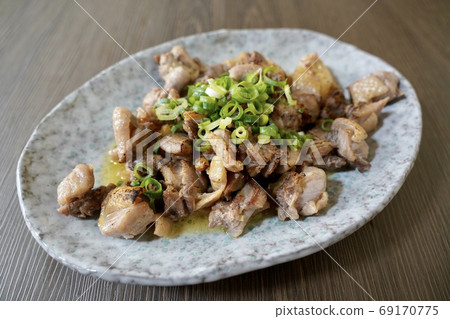 Charcoal grilling of local chicken 69170775