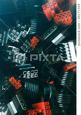 A close up view on a computer wires parts background vertical A close up view on a computer wires parts background vertical 69171304