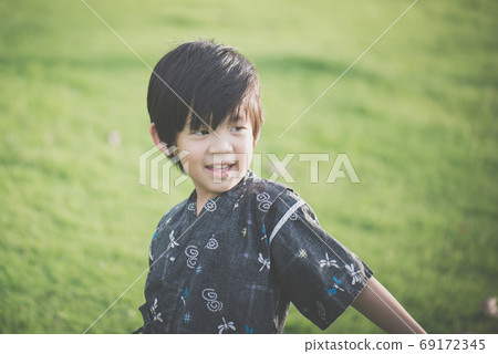 Cute Asian child in kimono Cute Asian child in kimono 69172345