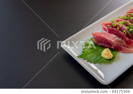 Bonito sashimi black background material 69175309