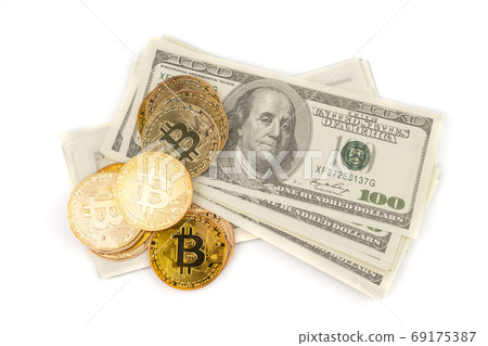 Golden Bitcoins of new digital money on banknotes Golden Bitcoins of new digital money on banknotes 69175387