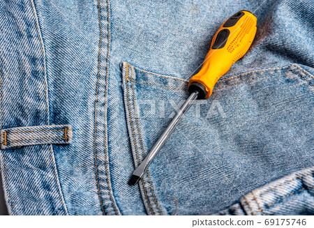 Orange crimping tools on jeans floor, anti-rust magnet technolog Orange crimping tools on jeans floor, anti-rust magnet technolog 69175746