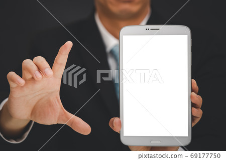 Businessman holding Digital tablet computer 69177750