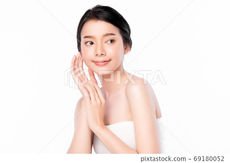 Beautiful Young asian Woman with Clean Fresh Skin, on white background, Face care, Facial treatment. 69180052