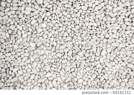 White pebble stone texture on the ground. White pebble stone texture on the ground. 69182132
