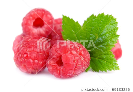 Raspberry with leaves isolated on white backgrounds. Raspberry with leaves isolated on white backgrounds. 69183226