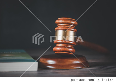 Old wood Judge hammer with law book on the white background, Old wood Judge hammer with law book on the white background, 69184132
