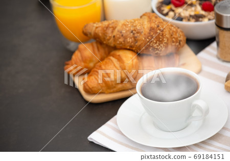 Breakfast Served in the morning with Hot black coffee and croiss Breakfast Served in the morning with Hot black coffee and croiss 69184151