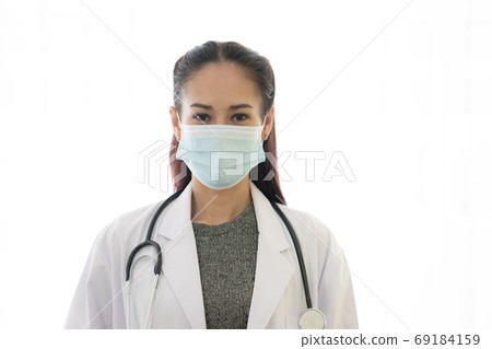Asian female doctor wearing medical mask isolated on white background. Coronavirus outbreak. Asian female doctor wearing medical mask isolated on white background. Coronavirus outbreak. 69184159