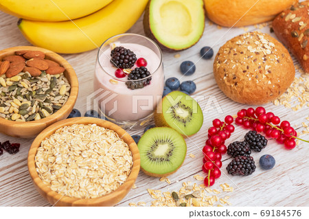 Fruit and Bread Whole grains and nuts, yogurt mix with Cherry Fruit and Bread Whole grains and nuts, yogurt mix with Cherry 69184576