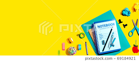 Notebooks with school supplies Notebooks with school supplies 69184921