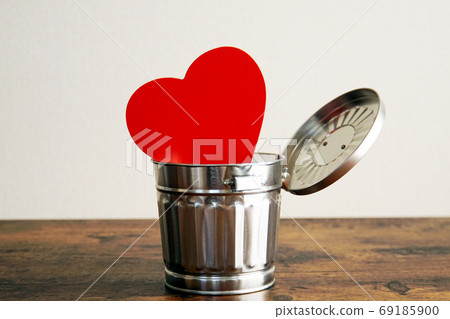 Red heart thrown in the trash Red heart thrown in the trash 69185900