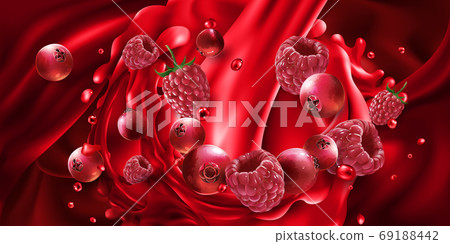 Cranberries and raspberries in red fruit juice. Cranberries and raspberries in red fruit juice. 69188442