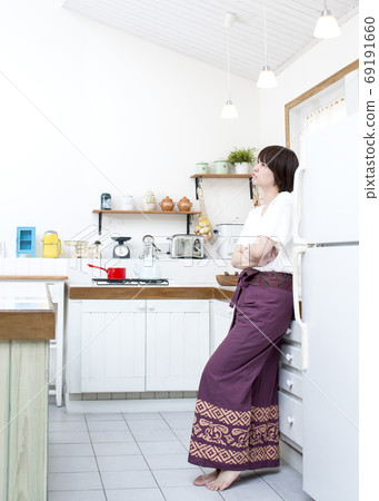 Woman frustrated in the kitchen Woman frustrated in the kitchen 69191660