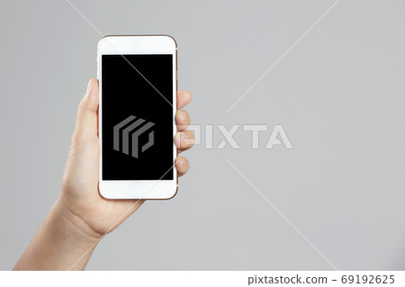 Hand,smartphone,cellphone,telephone,cell phone,phone Hand,smartphone,cellphone,telephone,cell phone,phone 69192625