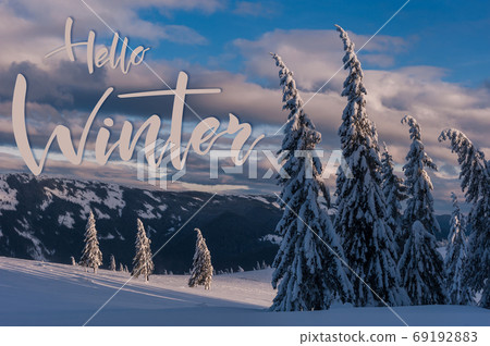 Winter evening in mountains and text 69192883