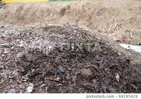 organic compost heap. fertilizer production for soil cultivation organic compost heap. fertilizer production for soil cultivation 69195428