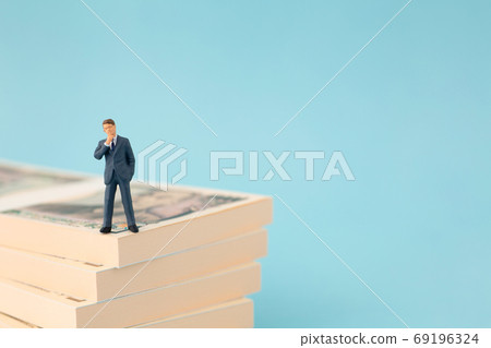 Businessman image to worry about money 69196324