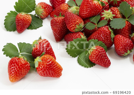 Lots of strawberries, strawberries and strawberries 69196420